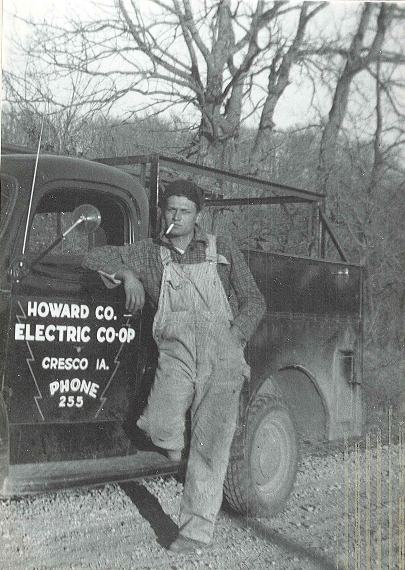 man in front of old truck in 1939